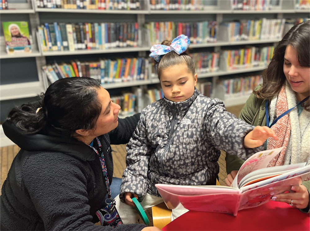  Student at local library with teachers